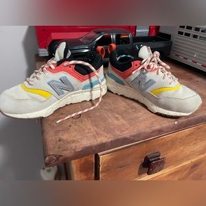 Little kid size 11 New Balance tennis shoes.